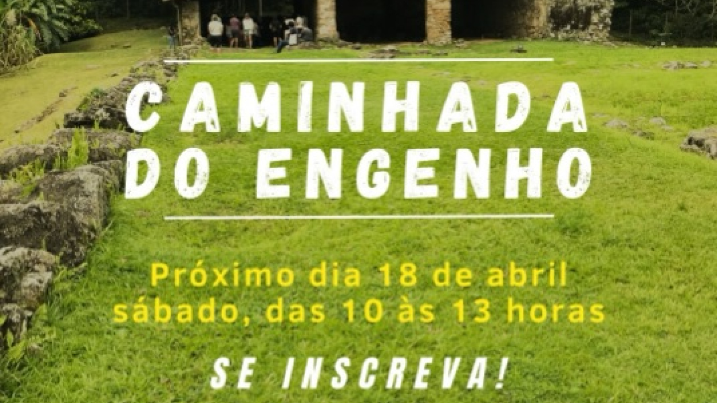 O cartaz anuncia a Caminhada do Engenho em Santos, destacando a conexão entre história e cultura negra com uma foto das ruínas do Engenho dos Erasmos ao fundo e informações sobre a data de 18 de abril