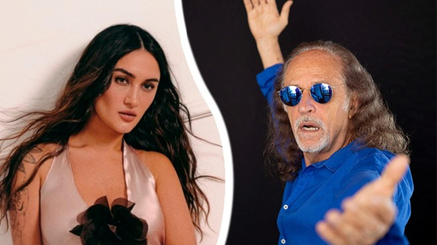 A imagem é dividida ao meio por uma curva branca, criando um contraste entre dois retratos. À esquerda, aparece uma mulher jovem com longos cabelos castanhos ondulados. Ela usa um vestido acetinado em tom rosado, com um detalhe floral escuro na parte frontal. Seu olhar é direto, sereno e confiante, com expressão suave.  À direita, há um homem mais velho, de cabelos compridos e grisalhos, usando óculos escuros de lentes espelhadas azuis e uma camisa azul vibrante.