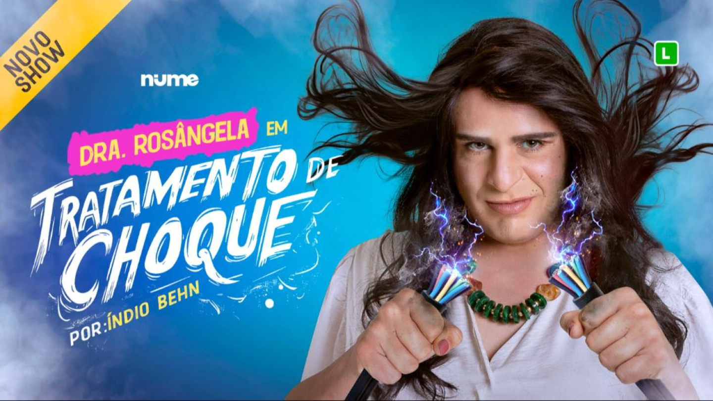 O cartaz anuncia o novo show de comédia "Dra. Rosângela em Tratamento de Choque", interpretado por Índio Behn, mostrando o personagem segurando cabos elétricos com faíscas e cabelos arrepiados sobre um fundo azul